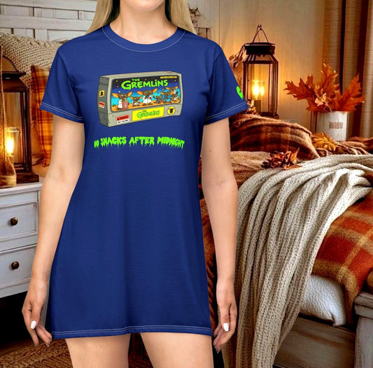 Model wearing a blue No Snacks After Midnight Gremlin graphic nightshirt dress featuring a retro 1980s VHS tape illustration with cute Mogwai monsters on it. Sold in The Fright Factory New Orleans gift shop.