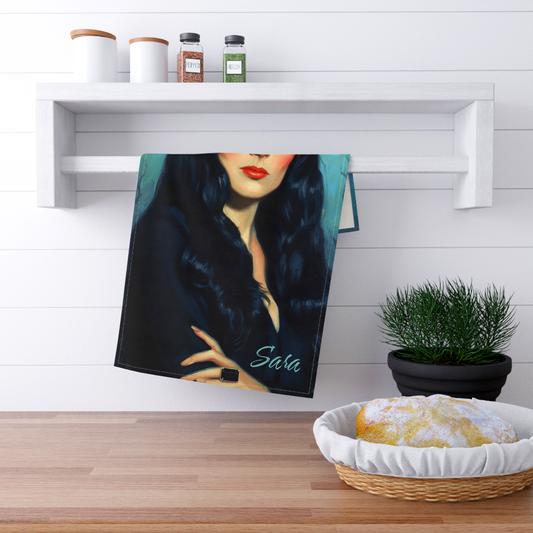 Custom Gothic Morticia Addams kitchen tea towel with personalized custom text at the bottom. For Sale in The Fright Factory New Orleans gift shop.