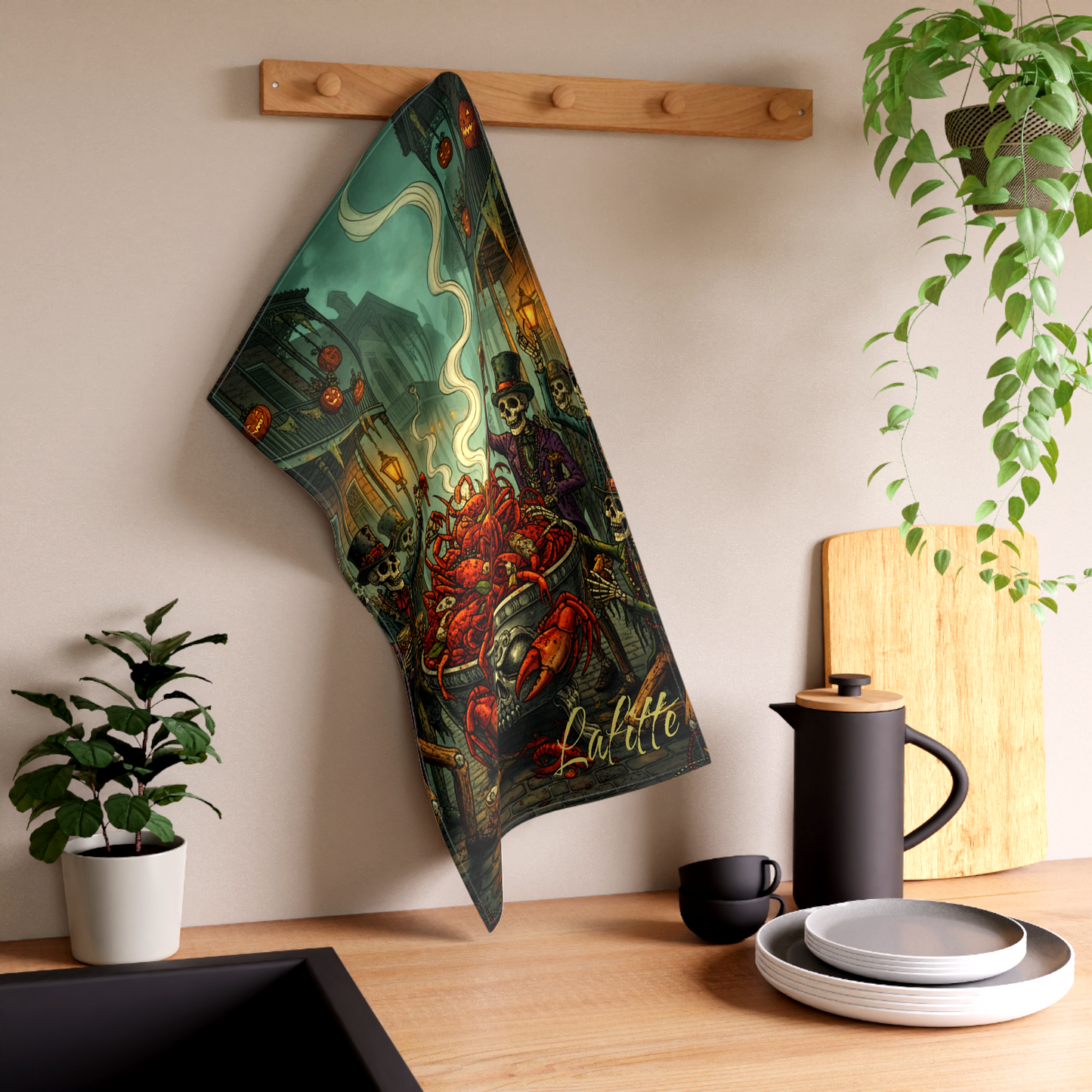 Unique personalized New Orleans souvenir cotton twill tea towel featuring spooky crawfish boil skull graphics for a gothic kitchen display. Available in The Fright Factory NOLA gift shop.