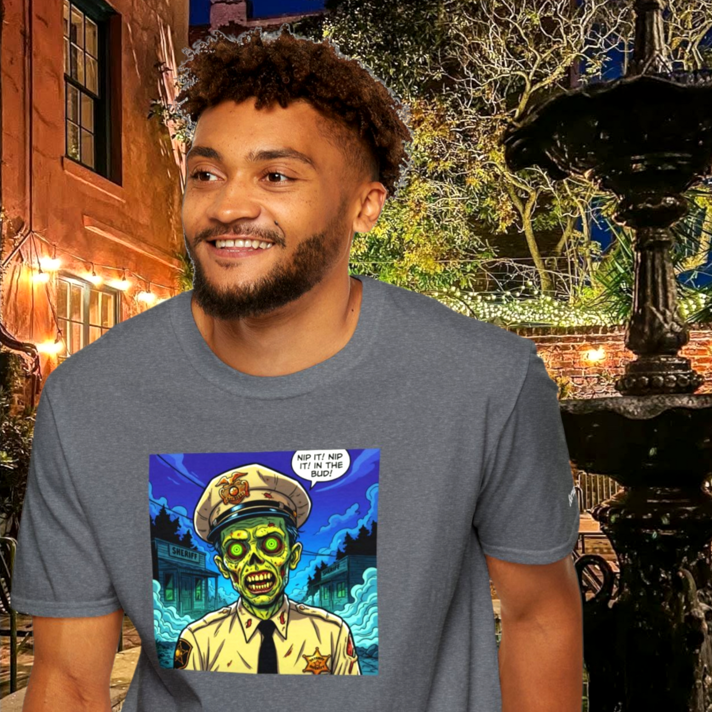 Man wearing the Zombie Barney Fife graphic tee while walking outdoors in New Orleans.