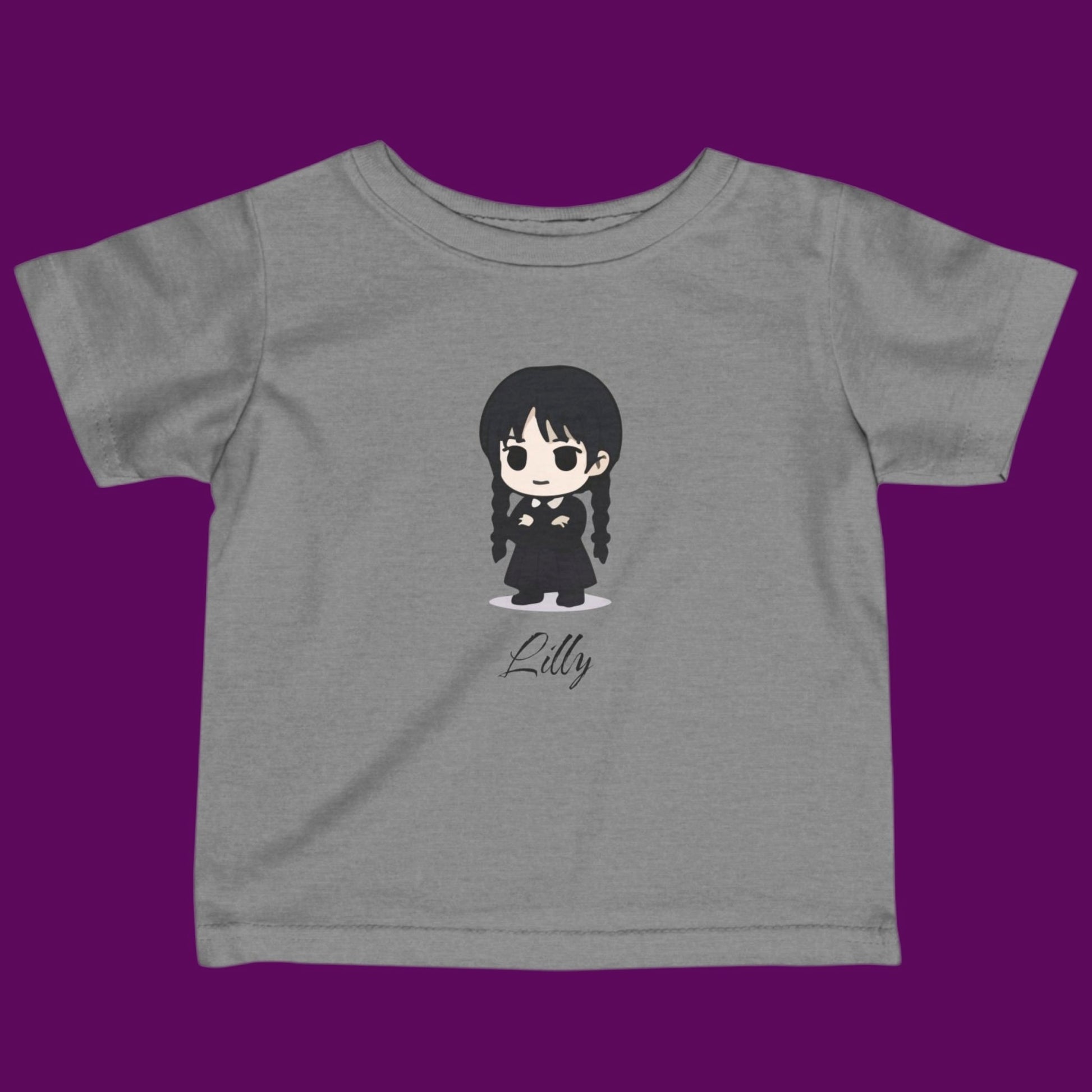 Custom Chibi Wednesday Addams inspired goth girl graphic with a personalized name on a gray kids t-shirt. Available in The Fright Factory New Orleans gift shop.