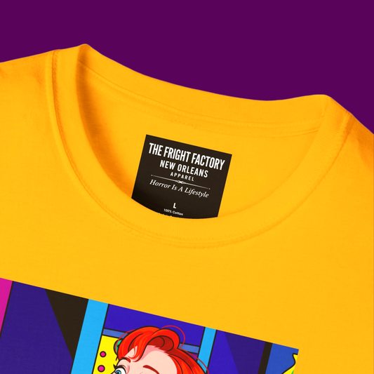Close-up of the high-quality pop art print of Delia Deetz, showing the sharp lines and vivid ink colors on the yellow  cotton fabric of the T-shirt from The Fright Factory NOLA.