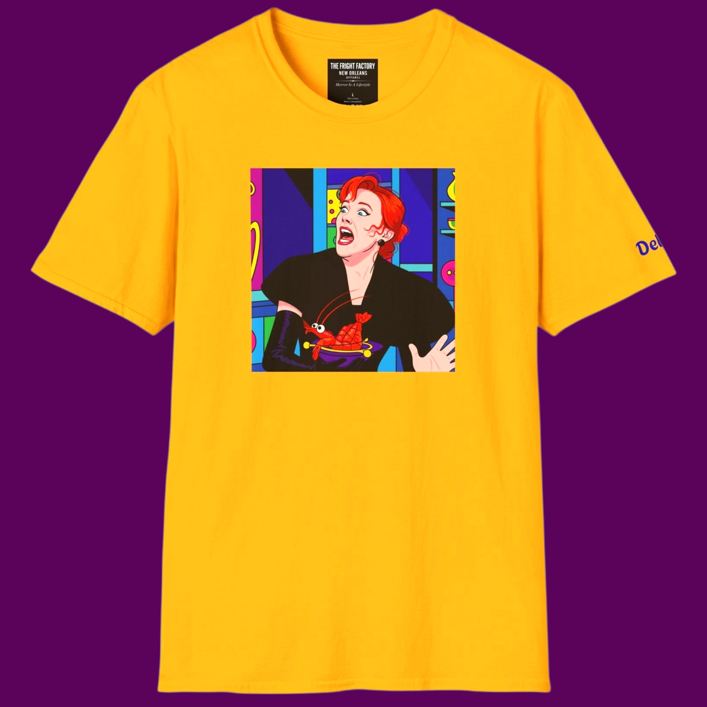Delia Deetz from Beetlejuice in a vibrant pop art style on a 100% cotton T-shirt by The Fright Factory. The design features high-contrast colors and Delia's iconic dramatic expression.