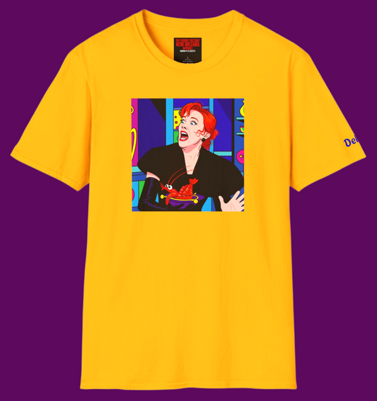 Delia Deetz from Beetlejuice in a vibrant pop art style on a 100% cotton T-shirt by The Fright Factory. The design features high-contrast colors and Delia's iconic dramatic expression.
