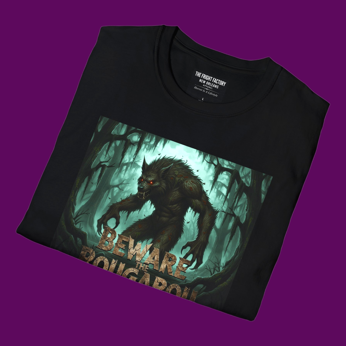 Closeup folded view of my personalized Rougarou swamp werewolf black t-shirt with distressed "Beware" text and custom name field, designed by The Fright Factory New Orleans.