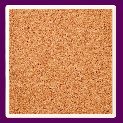 Close-up of the non-slip cork backing on a ceramic coaster, showing the protective layer for furniture and the durable build sold in The Fright Factory New Orleans.