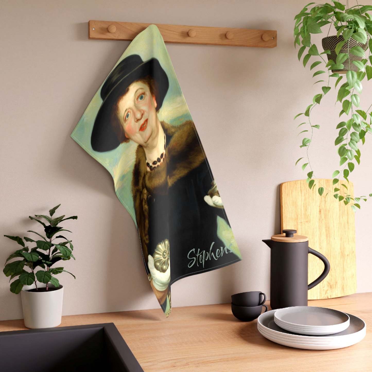 Personalized retro horror-style custom kitchen tea towel featuring a vintage illustration of Aunt Clara from Bewitched. Designed and available in The Fright Factory New Orleans horror gift shop