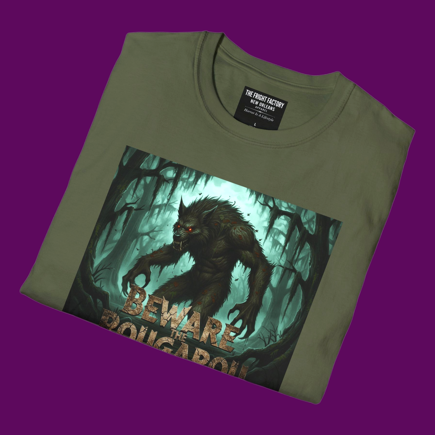 Closeup folded view of my personalized Rougarou swamp werewolf monster t-shirt with distressed "Beware" text and custom name field, designed by The Fright Factory New Orleans.