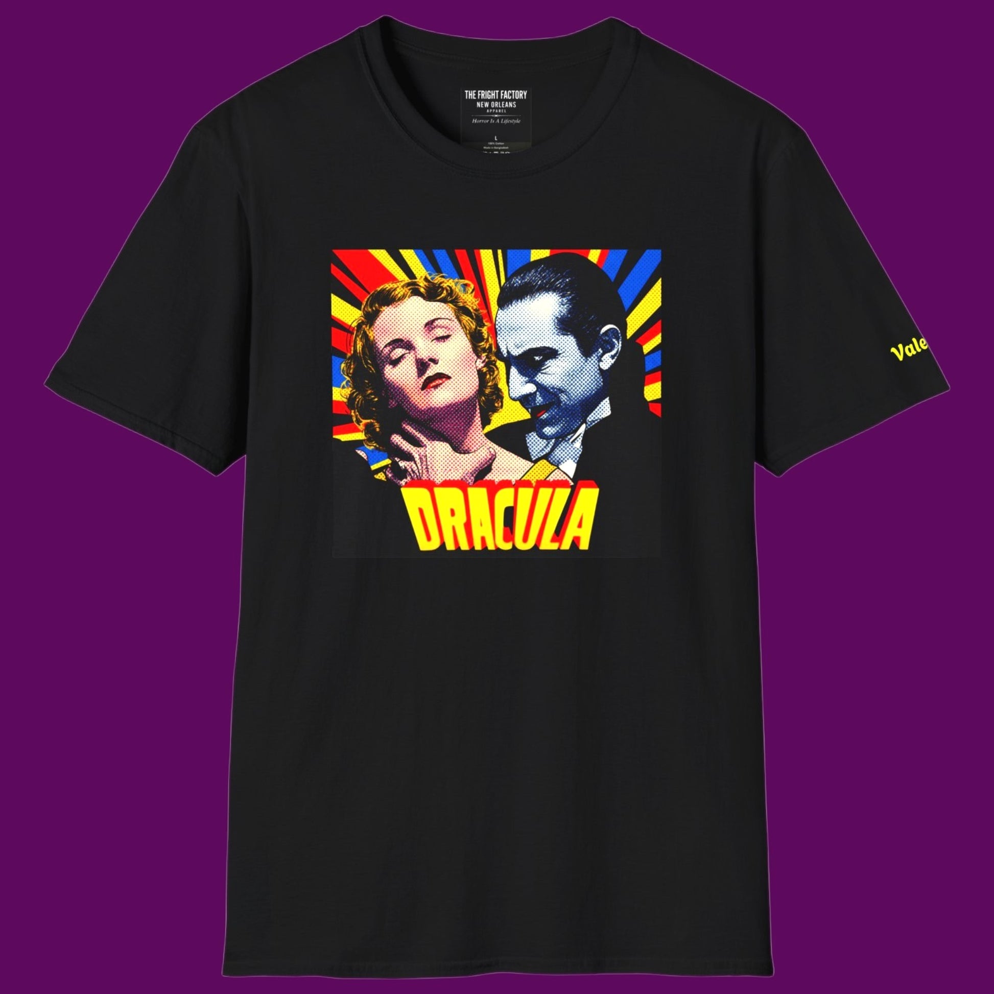 Black t-shirt featuring a retro pop-art graphic of Dracula and a victim in a vintage comic book style. For Sale in The Fright Factory, New Orleans.