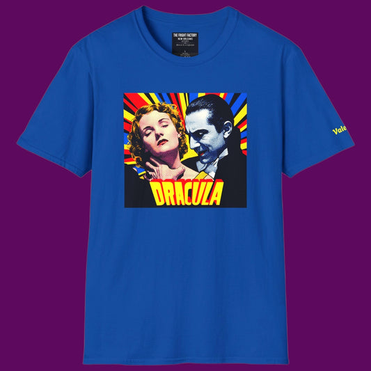 Royal blue t-shirt featuring a retro pop-art graphic of Dracula and a victim in a vintage comic book style. For Sale in The Fright Factory, New Orleans.