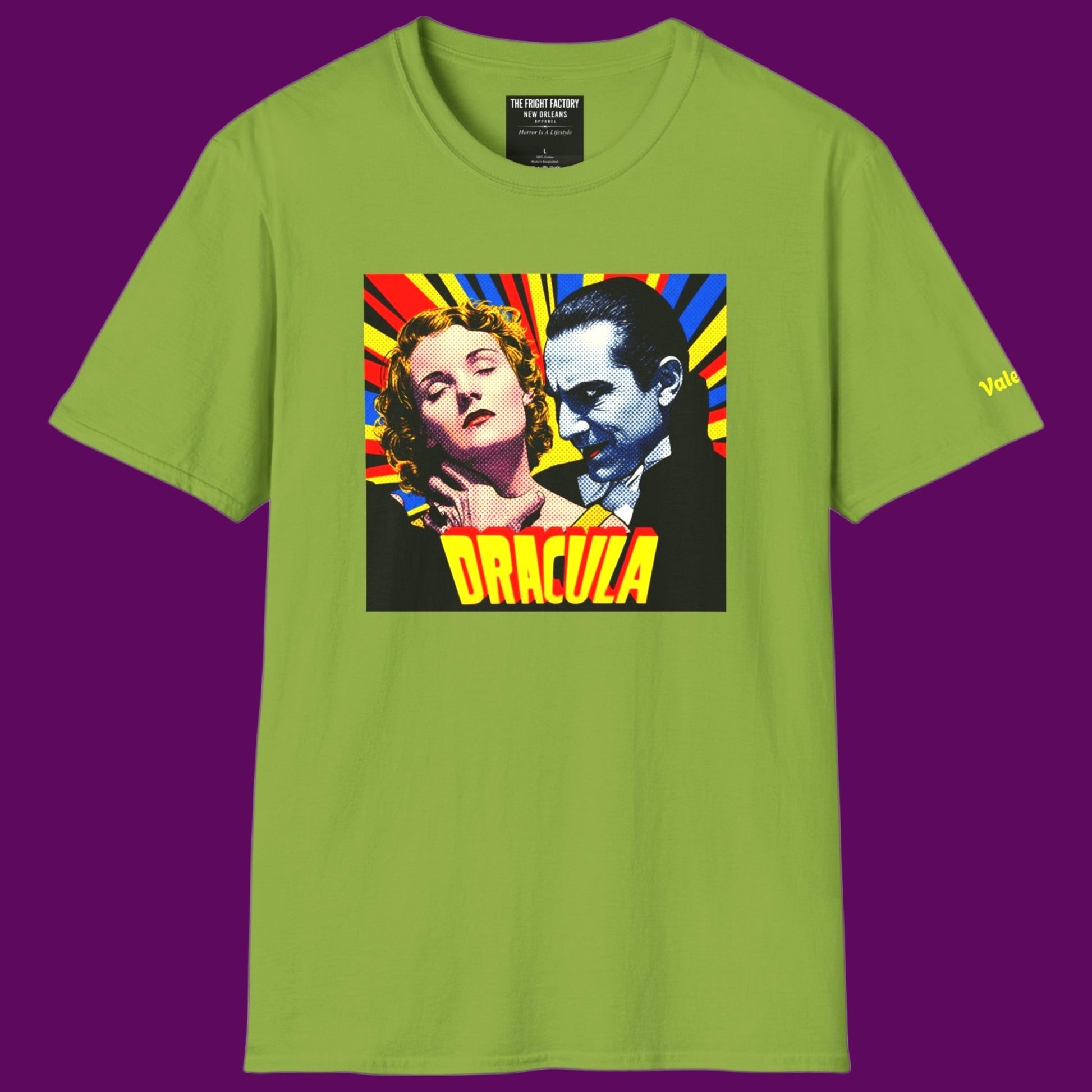 Lime green t-shirt featuring a retro pop-art graphic of Dracula and a victim in a vintage comic book style. For Sale in The Fright Factory, New Orleans.