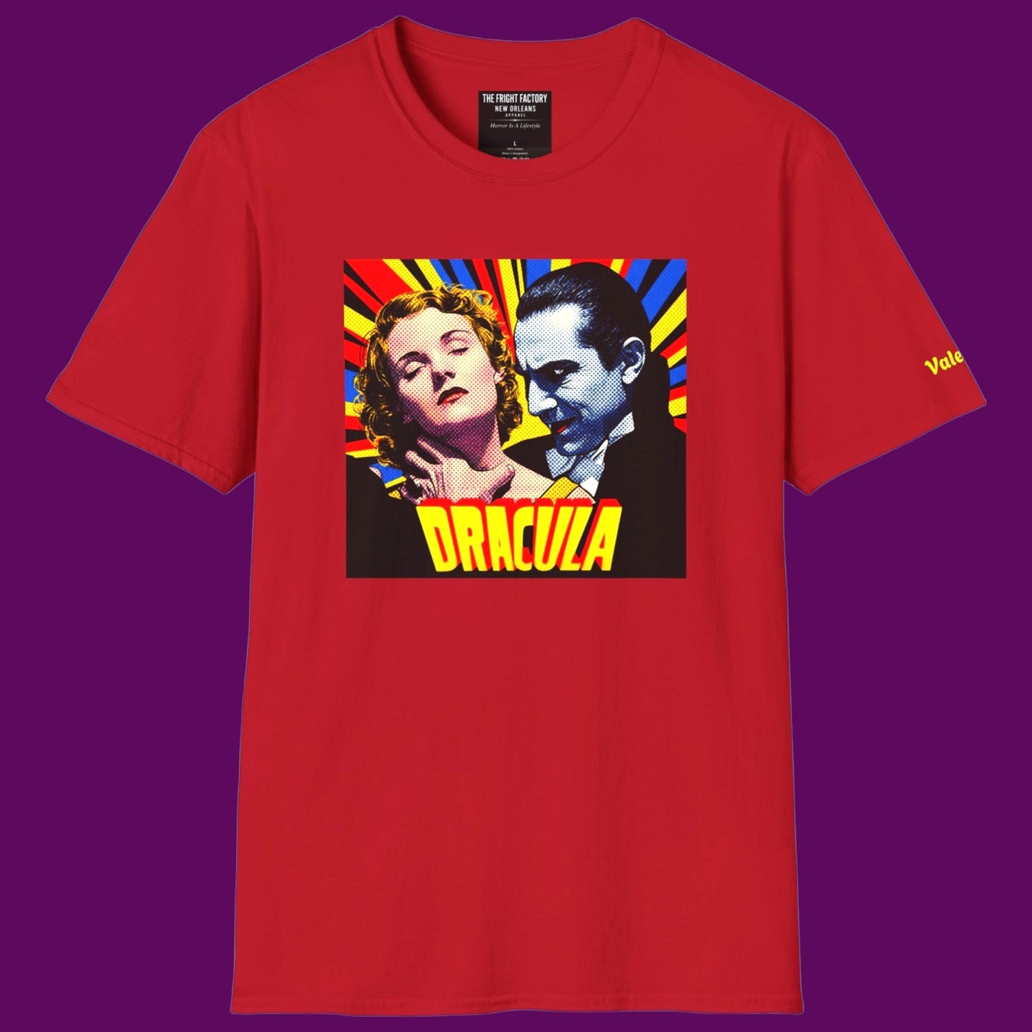 Cherry red t-shirt featuring a retro pop-art graphic of Dracula and a victim in a vintage comic book style. For Sale in The Fright Factory, New Orleans.