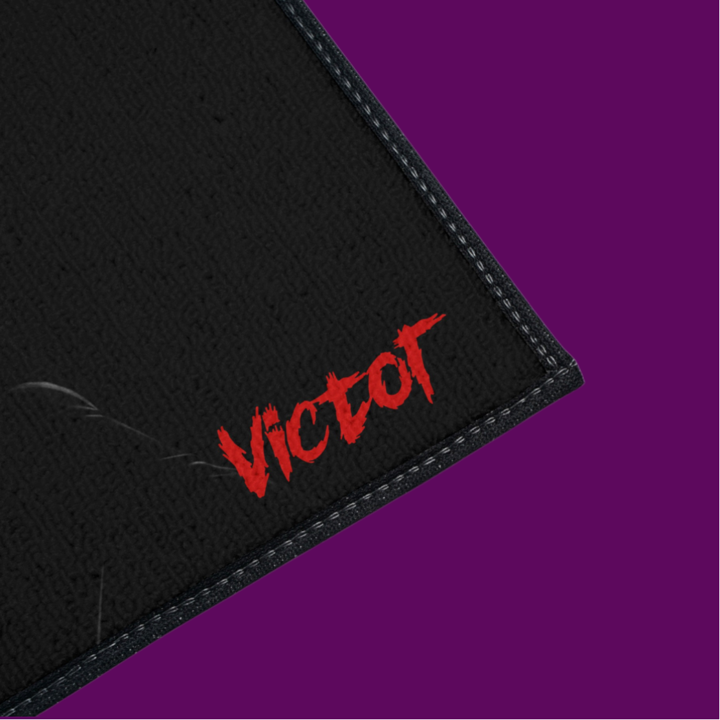 Close-up of the soft polyester surface and vibrant printed detail of the Elvira vampire art bath mat, showing the high-quality fabric texture