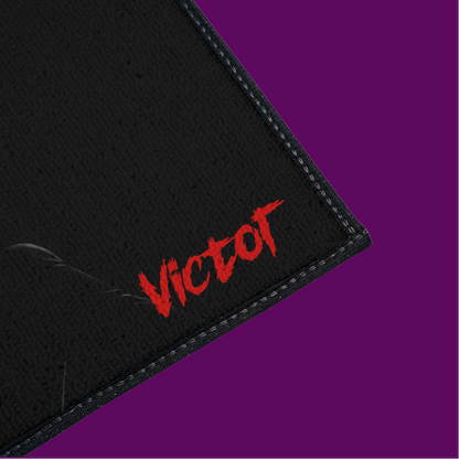  Close-up of the soft polyester surface and vibrant printed detail of the Elvira vampire art bath mat, showing the high-quality fabric texture