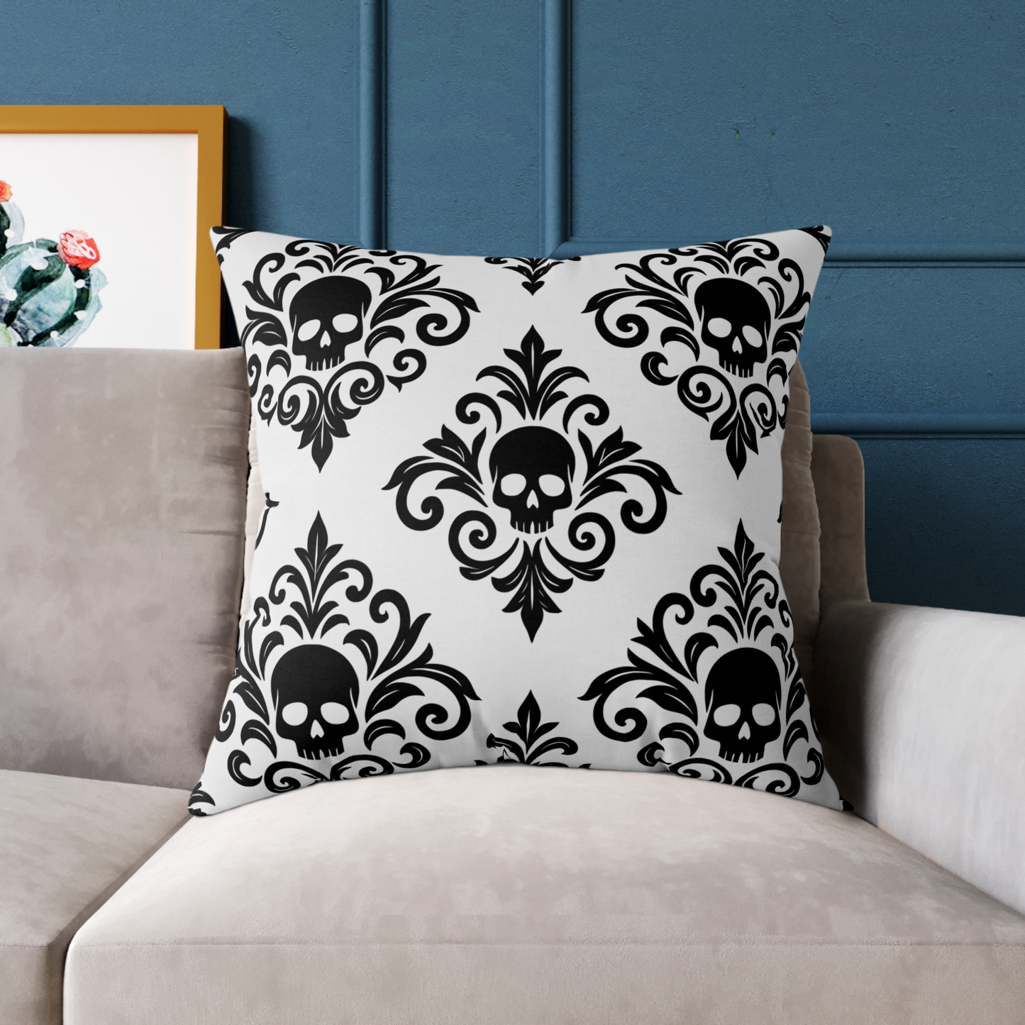 Gray and black personalized gothic skull damask square throw pillow on a sofa. Designed in The Fright Factory New Orleans gift shop.