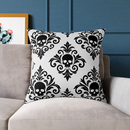 Gray and black personalized gothic skull damask square throw pillow on a sofa. Designed in The Fright Factory New Orleans gift shop.