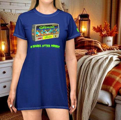 Model wearing a blue No Snacks After Midnight Gremlin graphic nightshirt dress featuring a retro 1980s VHS tape illustration with cute Mogwai monsters on it. Sold in The Fright Factory New Orleans gift shop.