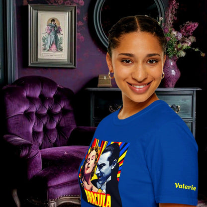 Model wearing a royal blue t-shirt featuring a retro pop-art graphic of Dracula and a victim in a vintage comic book style. For Sale in The Fright Factory, New Orleans.