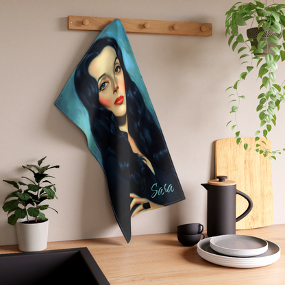 New Gothic Morticia Addams kitchen tea towel with personalized custom text at the bottom. For Sale in The Fright Factory New Orleans gift shop.