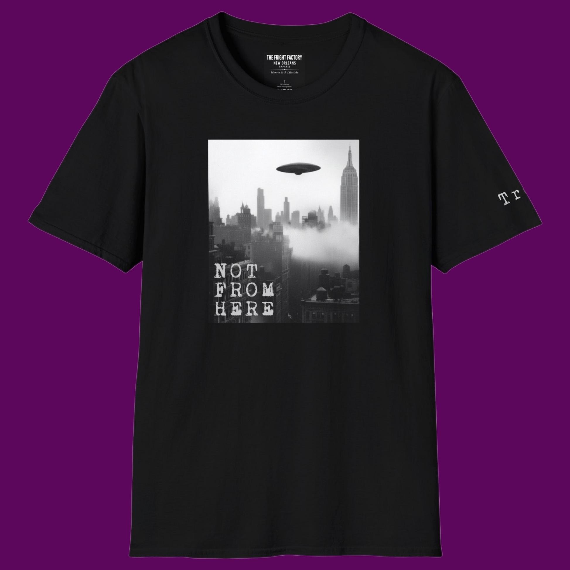 The Fright Factory New Orleans custom apparel: 'Not From Here' sci-fi graphic tee designed by Rocket Hulsey.