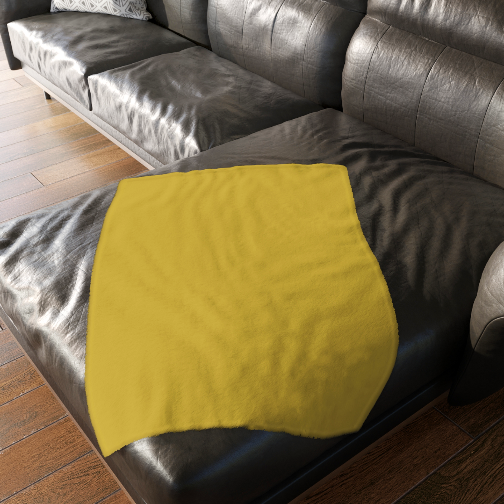 A high-quality back sise view of a throw blanket on a sofa featuring a detailed portrait of Jack Torrance from The Shining. The image is created Jack Nicholson’s iconic intense expression against a backdrop inspired by the Overlook Hotel. Only sold in The Fright Factory New Orleans.