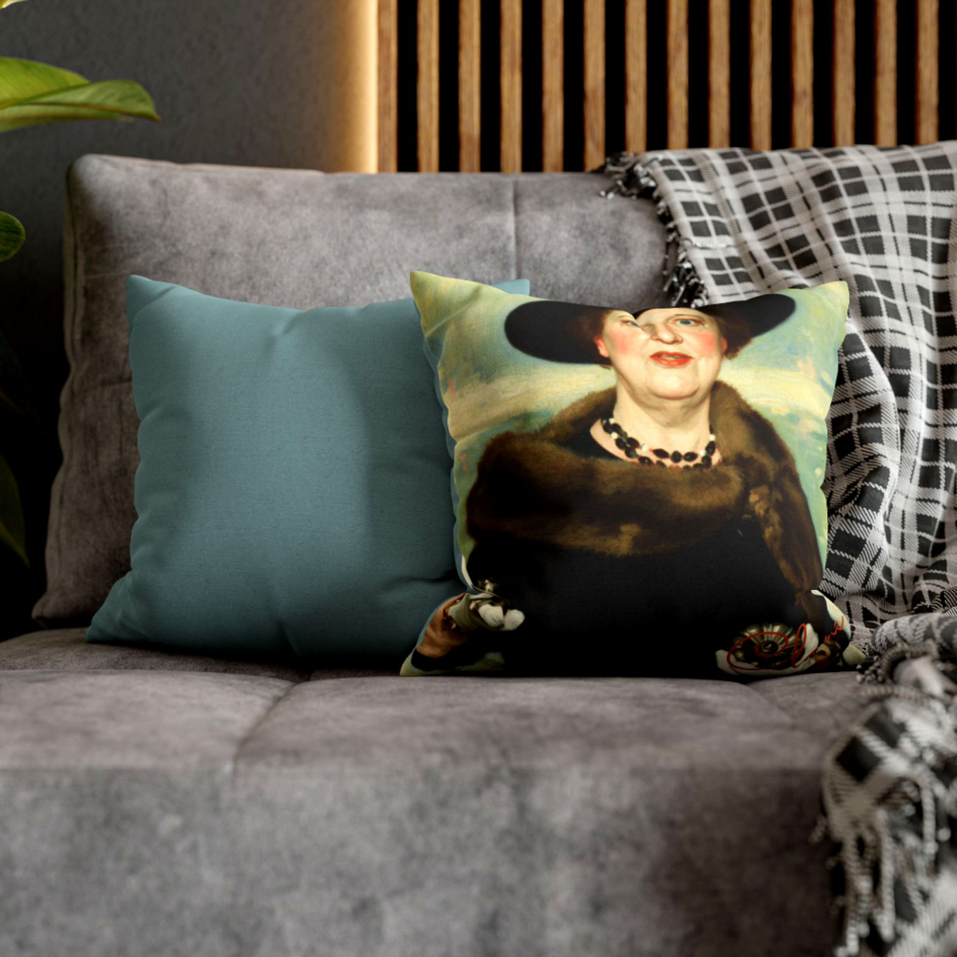 Retro TV-inspired Aunt Clara pillowcase on a sofa, bringing a touch of 1164 Morning Glory Circle to modern witchy bedroom decor.
